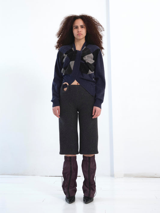 The Twisted Knit Sweater in dark blue argyle